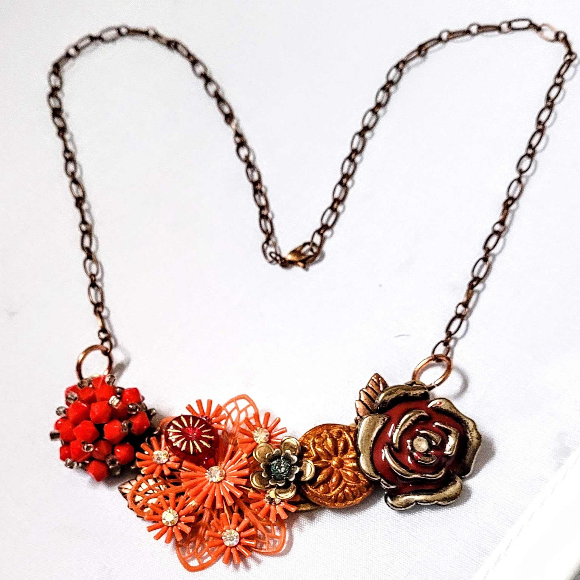 Red and orange vintage collage necklace